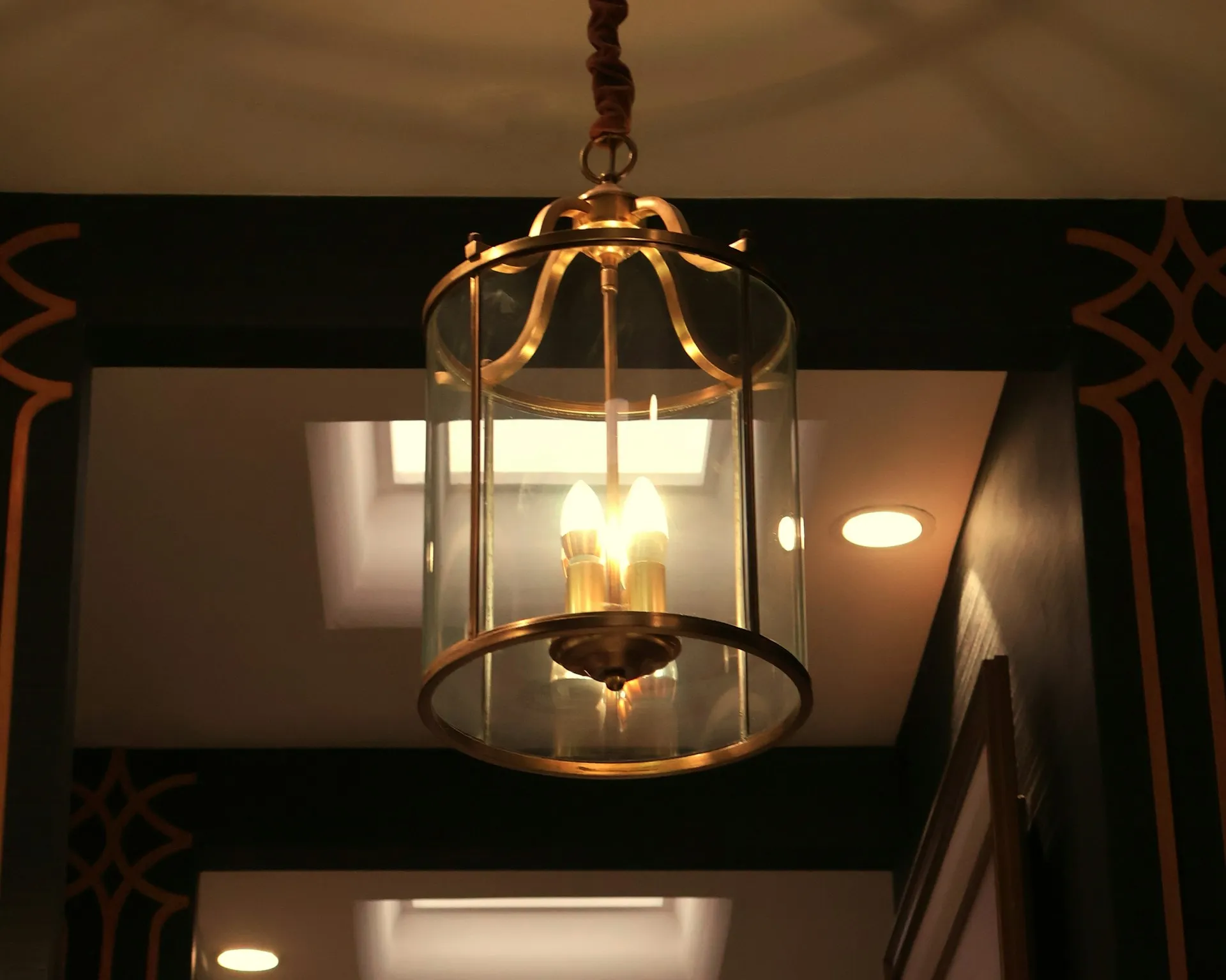 A brass lantern beside a front door