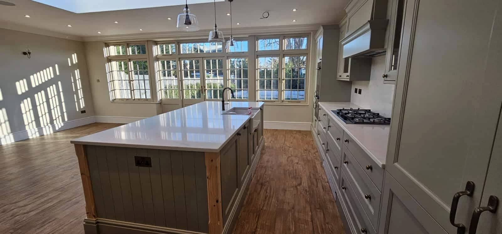 Kitchen with a large island and garden doors, Loughton