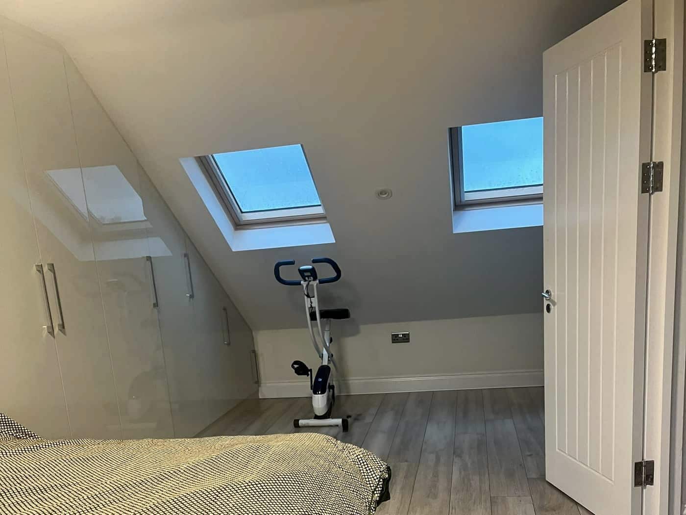 Loft bedroom with Velux windows, Barkingside