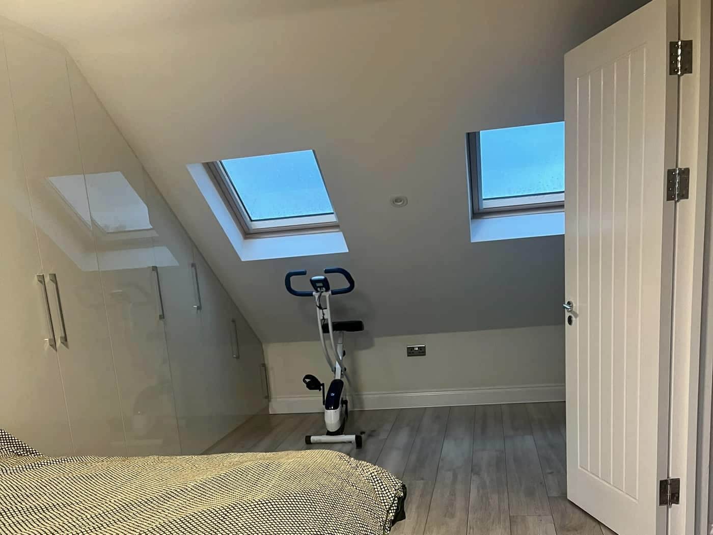Loft bedroom with Velux windows, Barkingside